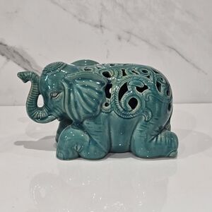 Urban Trends | Ceramic Laying Turquoise  Elephant Trunk Up Good Luck